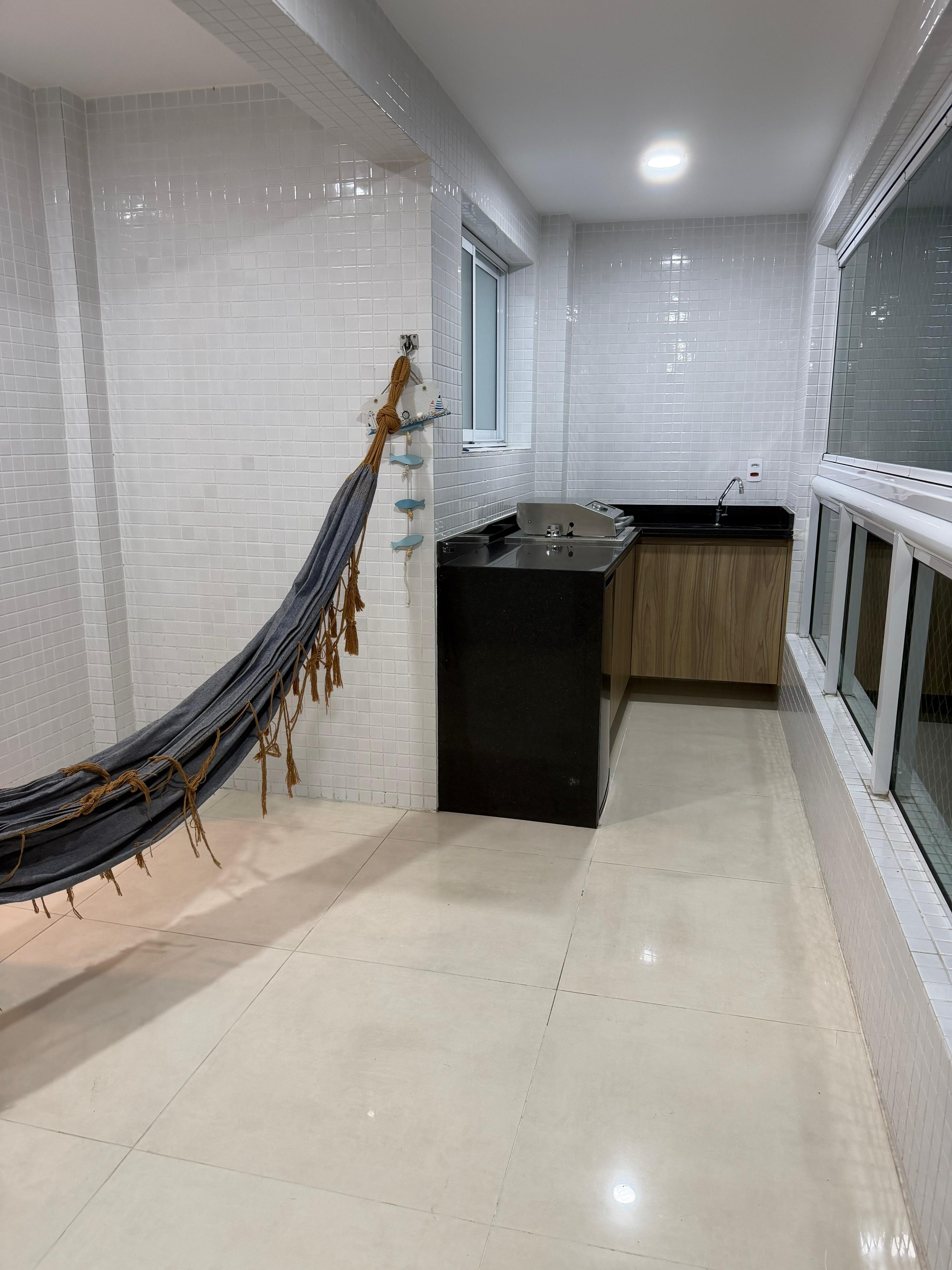 Sacada com espaço gourmet e churrasqueira